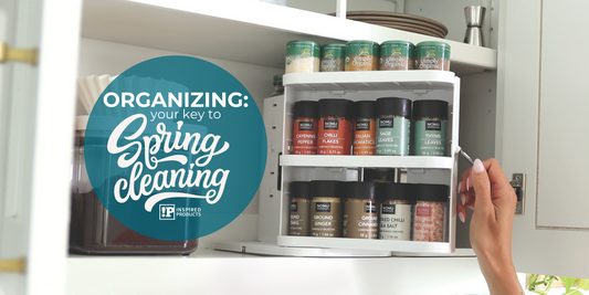 hand pulling out rotating spice rack holder to show organized spices with phrase "organizing: your key to Spring Cleaning"